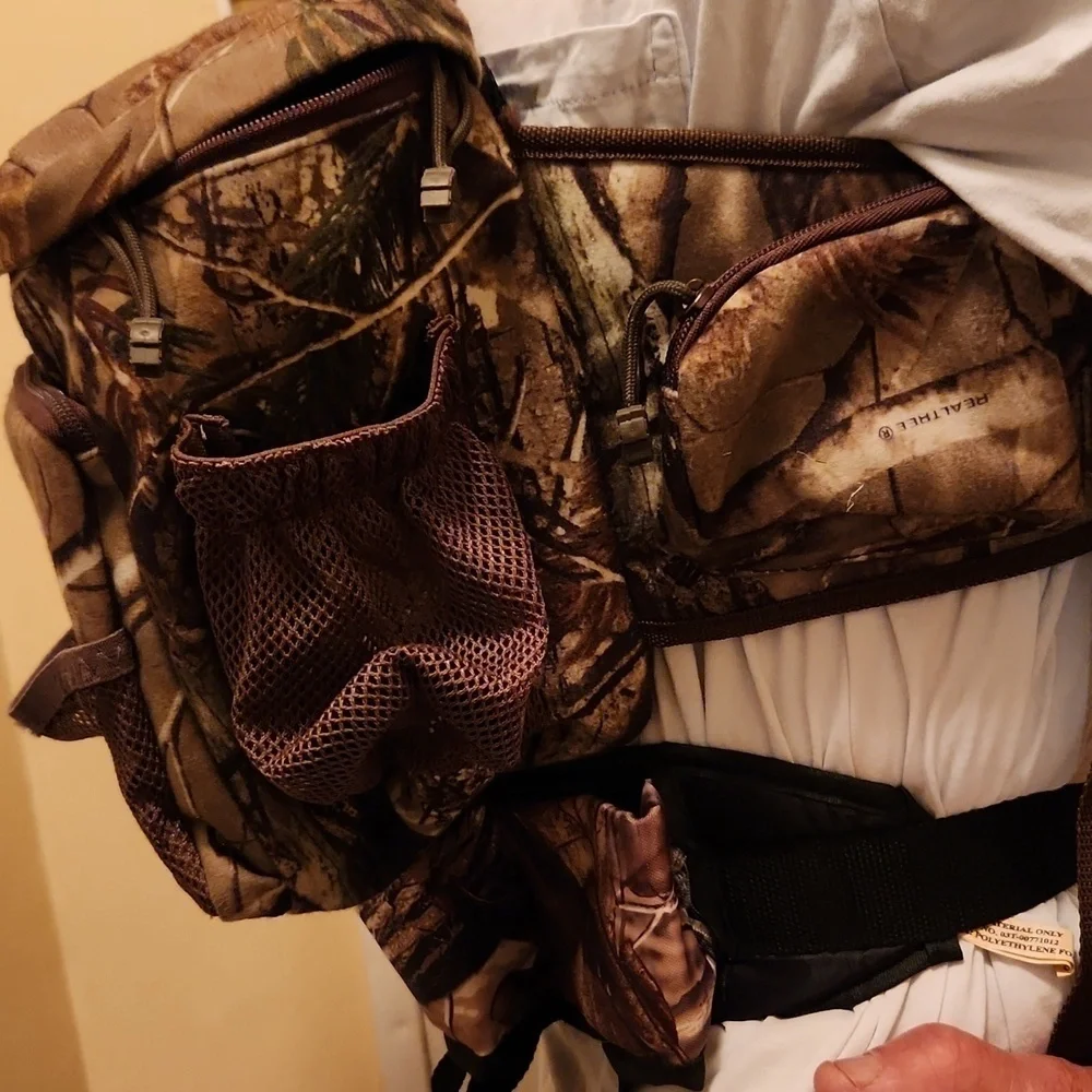 Bundle of 2 - Mad Dog Camo Backpack and Realtree Camo Hunter Outdoor Waist.